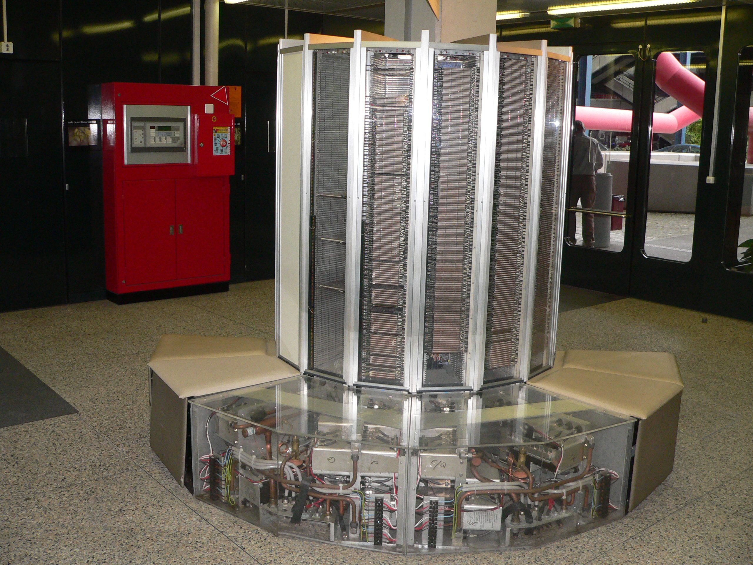 A Cray-1 at EPFL, Lausanne. The machine's vector-processing hardware was useless without a compiler that could automatically vectorise FORTRAN loops. Cray Research's CFT compiler, released in 1978, was the first. ECMWF installed its Cray-1A in 1978 and started producing vectorised weather forecasts. Photo: Rama (CC BY-SA 2.0 FR).