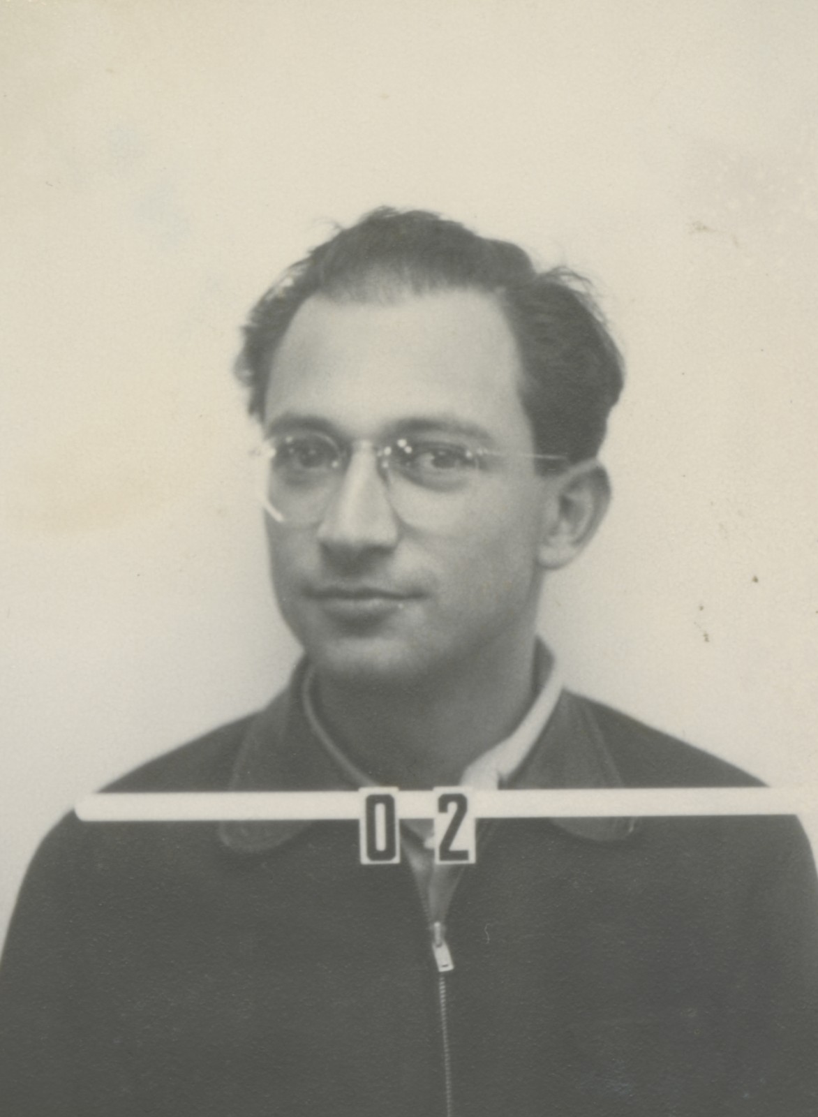 Stanley Frankel, Los Alamos badge photo, circa 1943. He was 24 years old when he arrived at the laboratory. Photo: Los Alamos National Laboratory, public domain.