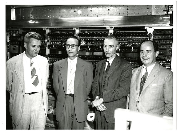 Julian Bigelow, Herman Goldstine, J. Robert Oppenheimer, and John von Neumann in front of the IAS machine, 1952. Photo: Alan Richards, Shelby White and Leon Levy Archives Center, Institute for Advanced Study, CC BY 4.0.