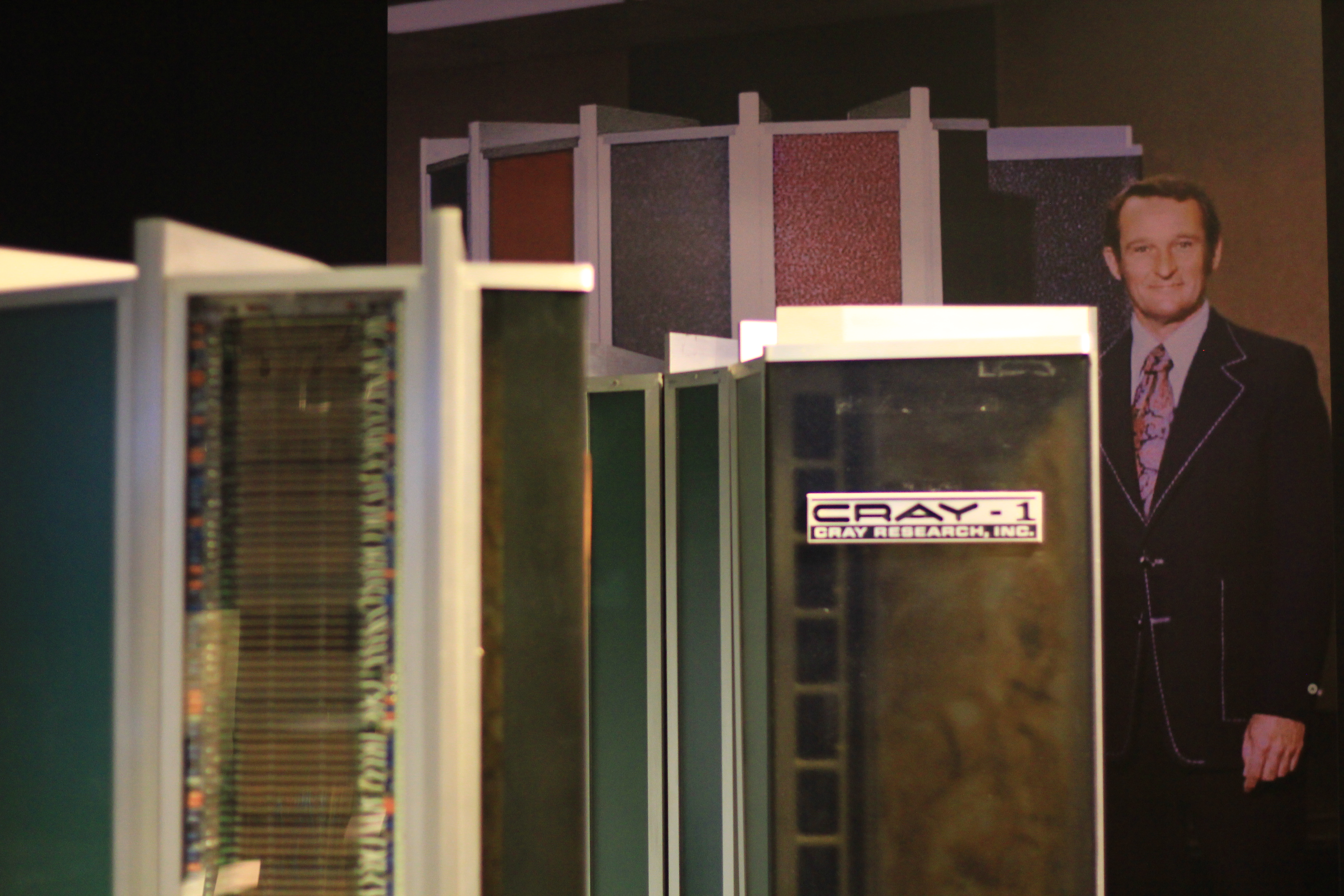 Seymour Cray behind one of his cylindrical Cray-1 machines.