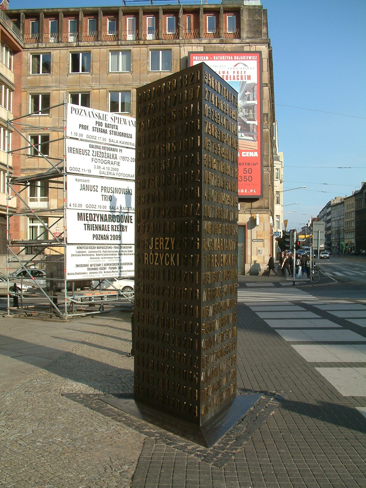 The Enigma Codebreakers Monument in Poznan, unveiled in 2007. Three bronze pillars for three mathematicians. The inscription reads: "To the memory of Marian Rejewski, Jerzy Rozycki, Henryk Zygalski -- mathematicians, Polish Army officers, who by breaking Enigma ciphers contributed to the victory over Nazi Germany." Photo: Wikimedia Commons.