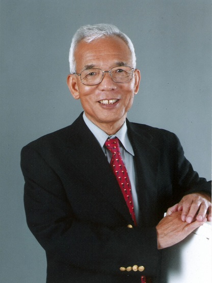 Syukuro Manabe in 2021, shortly after the announcement of his Nobel Prize in Physics. Manabe's 1967 radiative-convective model produced a climate sensitivity of +2.3 degrees Celsius for a doubling of atmospheric CO2. That number sits inside the 2021 IPCC likely range, fifty-four years later. His code was FORTRAN IV on an IBM 7090 at GFDL. Photo: Cabinet Office of Japan, 2021 (CC BY 4.0).