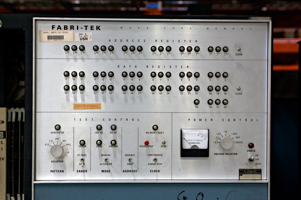A Fabri-tek mass core memory module at the Computer History Museum. Each tiny ferrite ring stores one bit -- threaded by hand onto a grid of wires. This is what computer memory looked like before silicon. Photo: Marcin Wichary, CC BY 2.0.