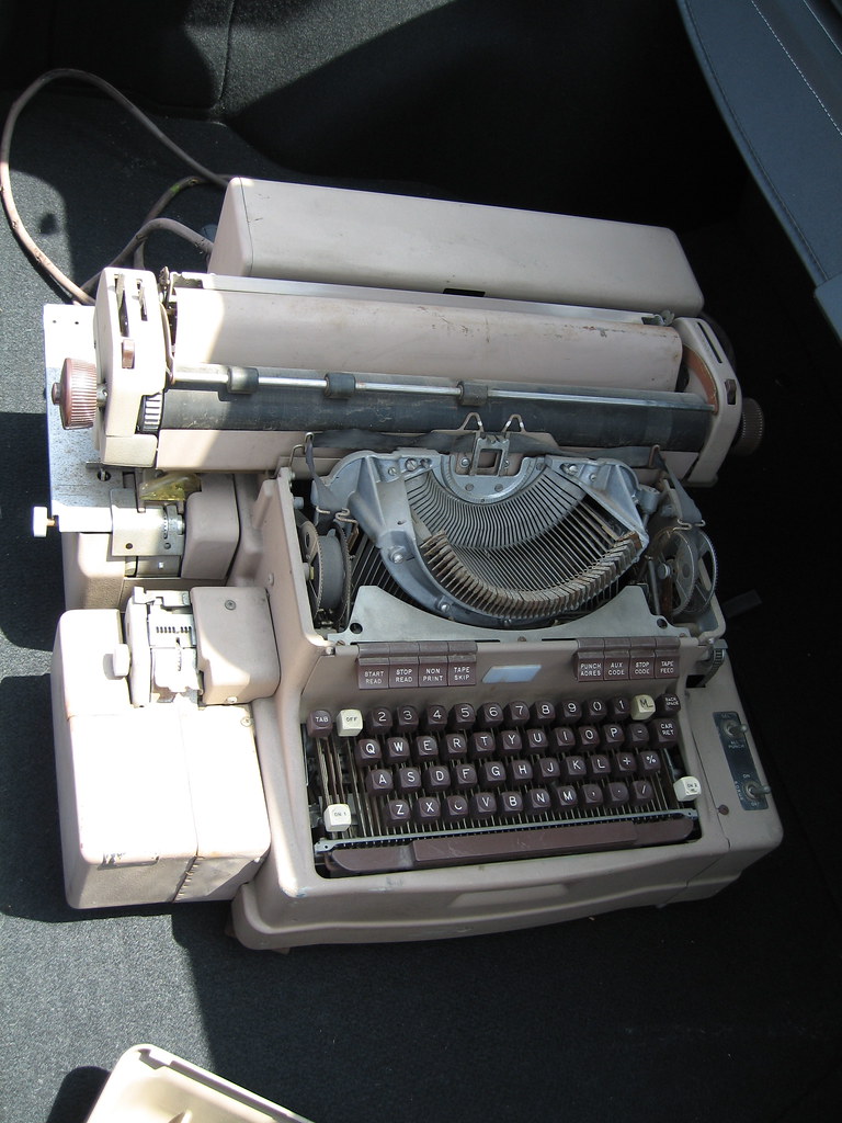 A Friden Flexowriter -- the electromechanical typewriter that served as the LGP-30's keyboard, printer, and paper tape reader in one clattering package. Lorenz typed his fateful rounded numbers on a machine just like this. Photo: Twylo, CC BY-SA 2.0.